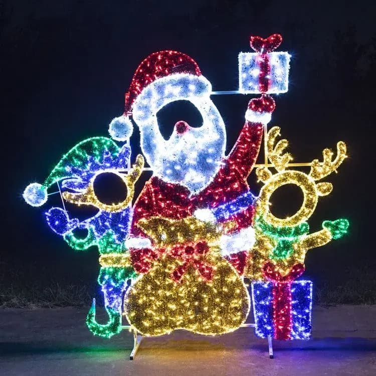 3D LED Santa, elf and reindeer display lit outdoors