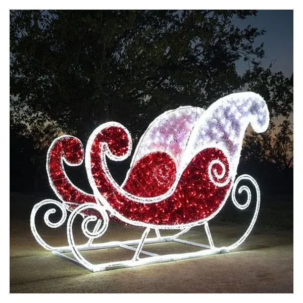 Illuminated 3D LED Santa sleigh display set up outdoors at night