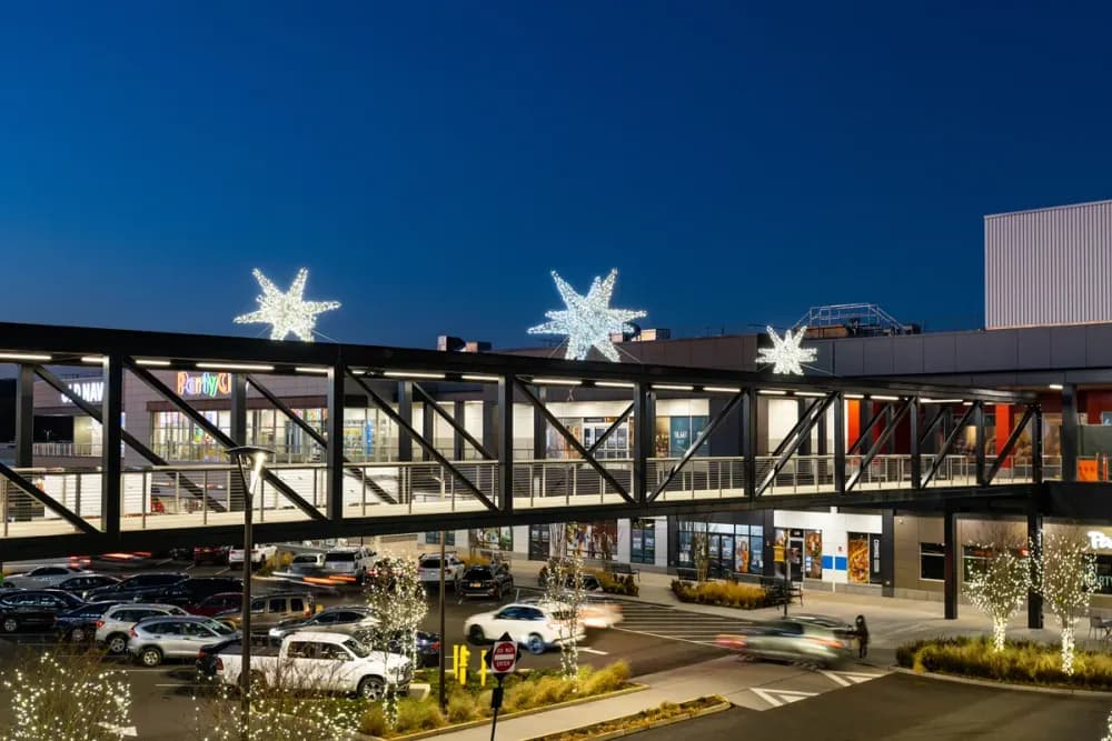 Illuminated commercial holiday display lighting a public space