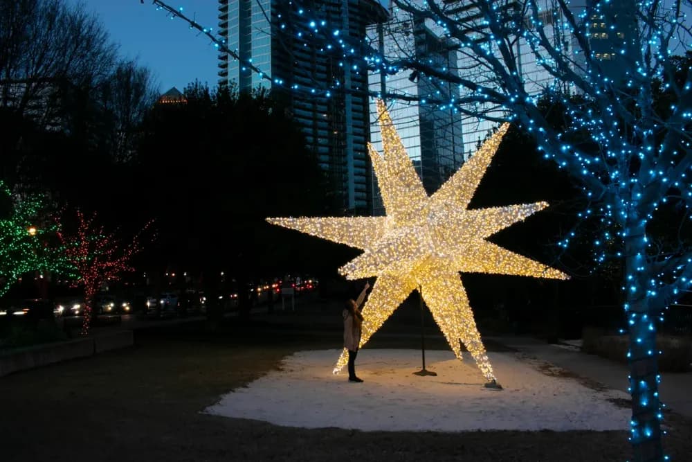 Illuminated commercial holiday display lighting a public space