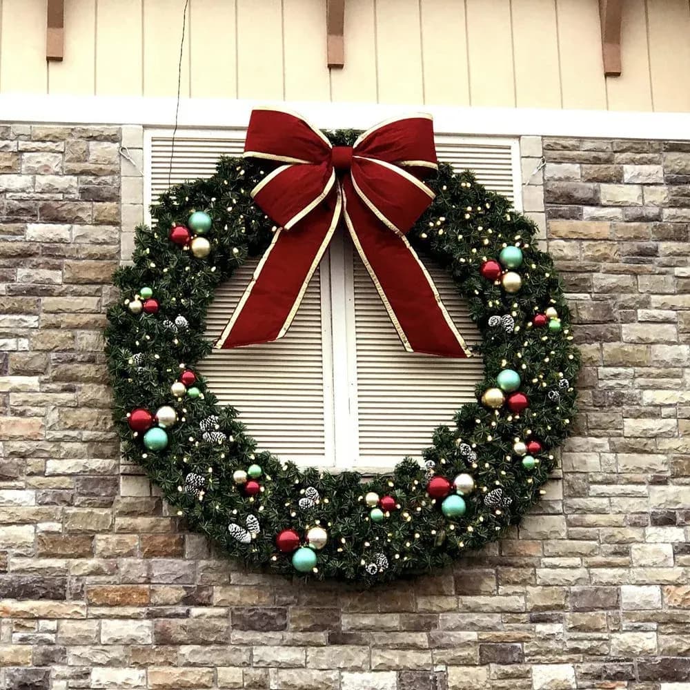 Ornamented commercial wreath mounted on a building front